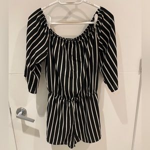 Small black and white romper (long sleeves and shorts)